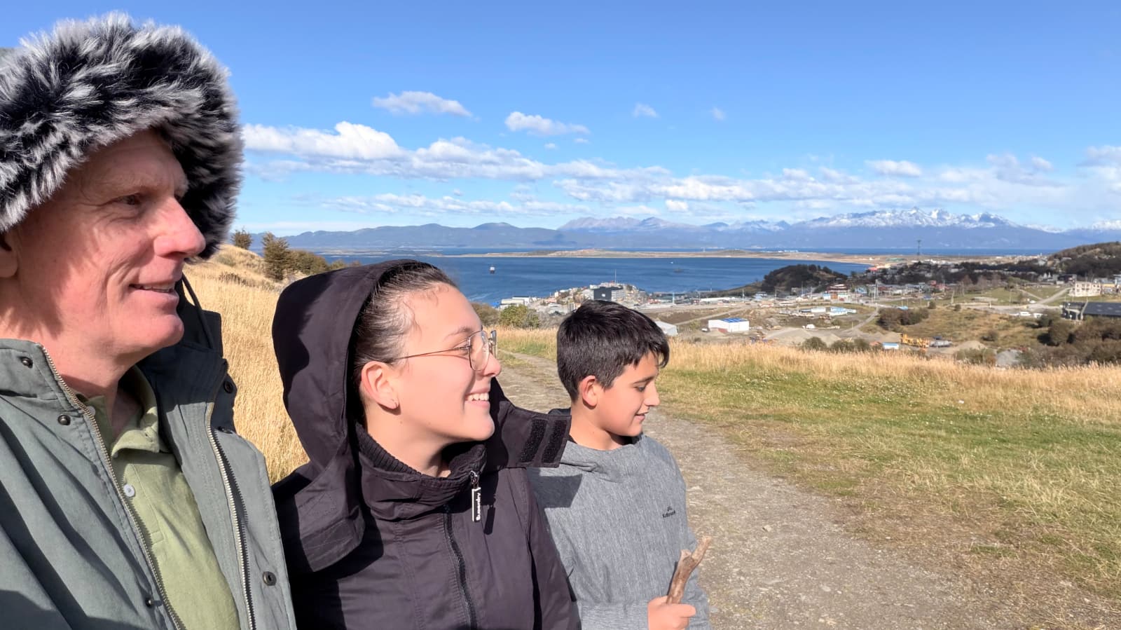 Me and the kids standing on the mountain side.