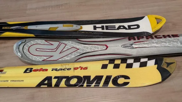 collection of alpine skis circa 1990s to ealry 2000s