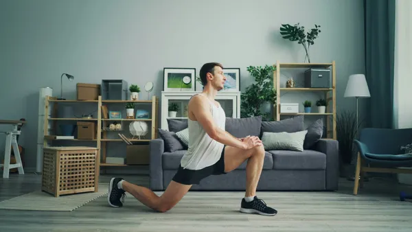 Image of man doing stretching exercise