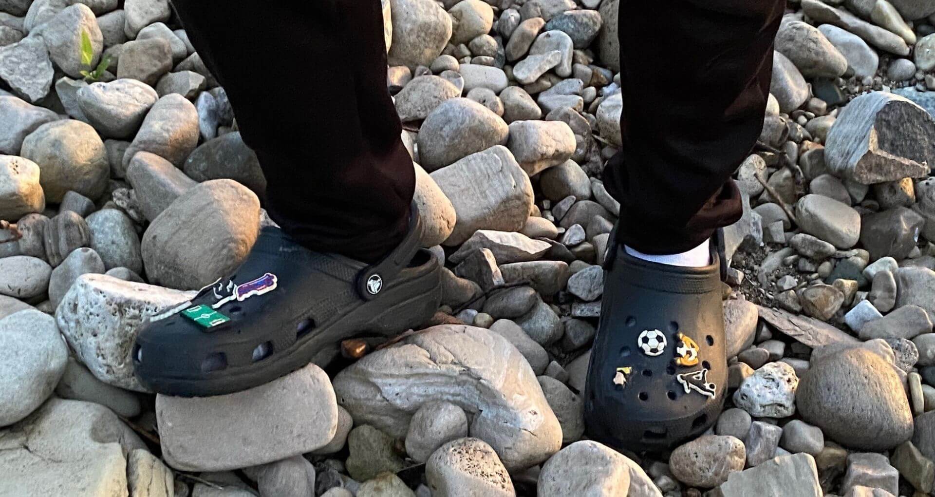 Our Grandson sporting his Crocs with socks and soccer Jibbitz charms lakeside!