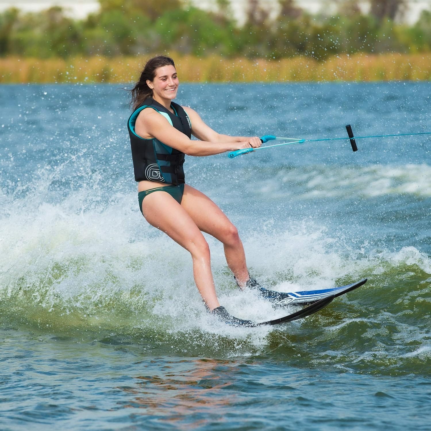 Girl water skiing with O'Brien Women's Impulse Neo Life Vest