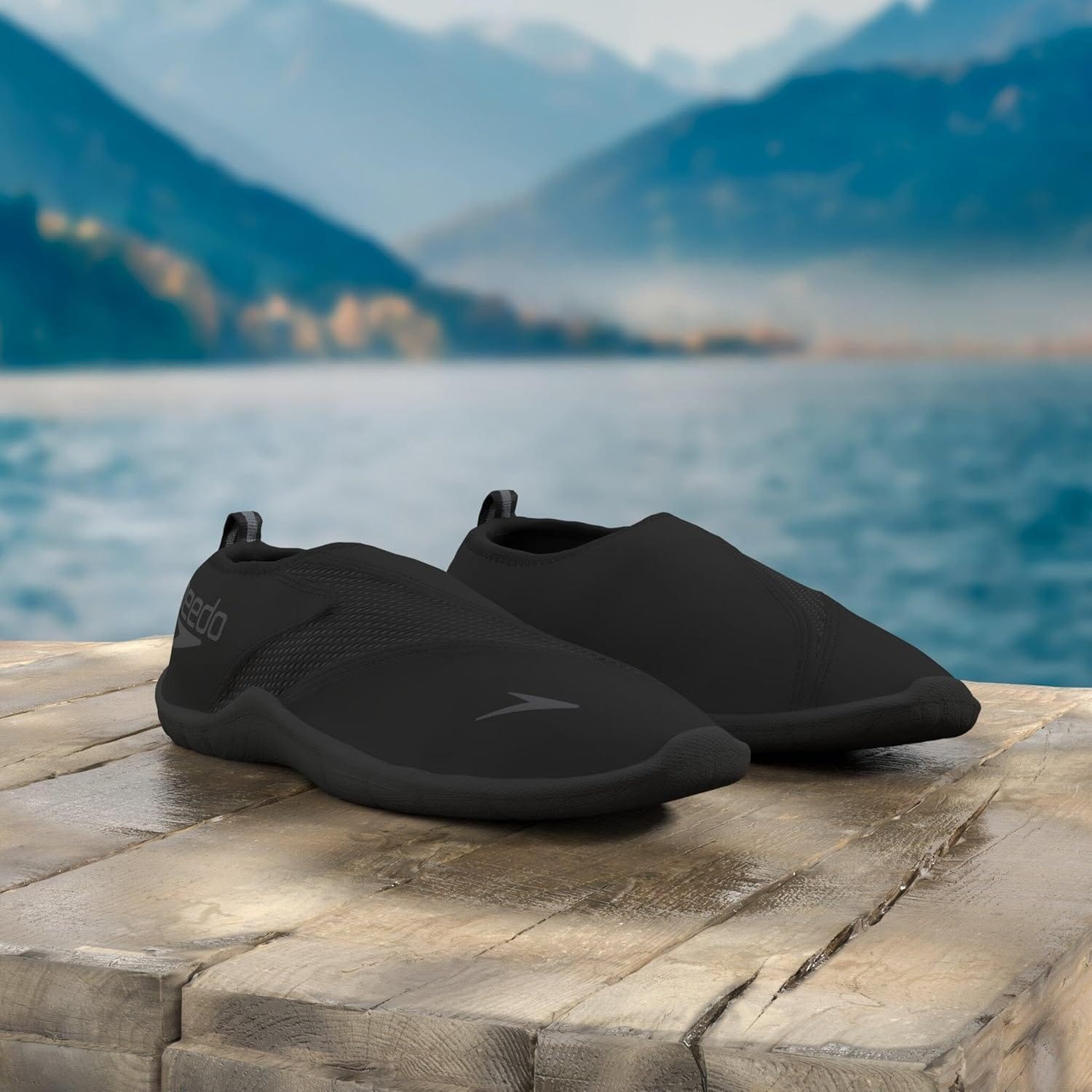 Mens Speedo Water Shoes in black drying on the dock