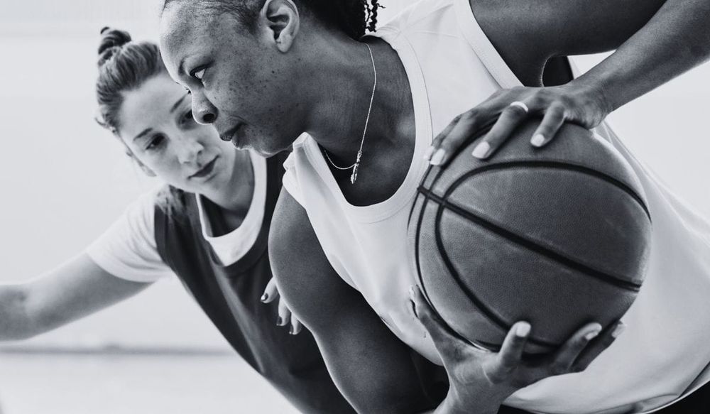 Best 28.5 basketball two women playing a game
