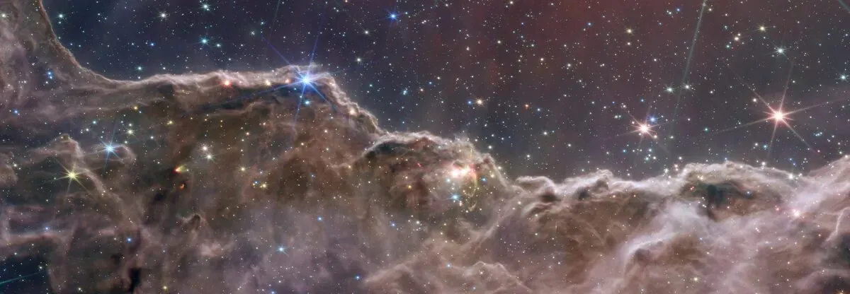 The Cosmic Cliffs of the Carina Nebula imaged in infrared by the James Webb Space Telescope