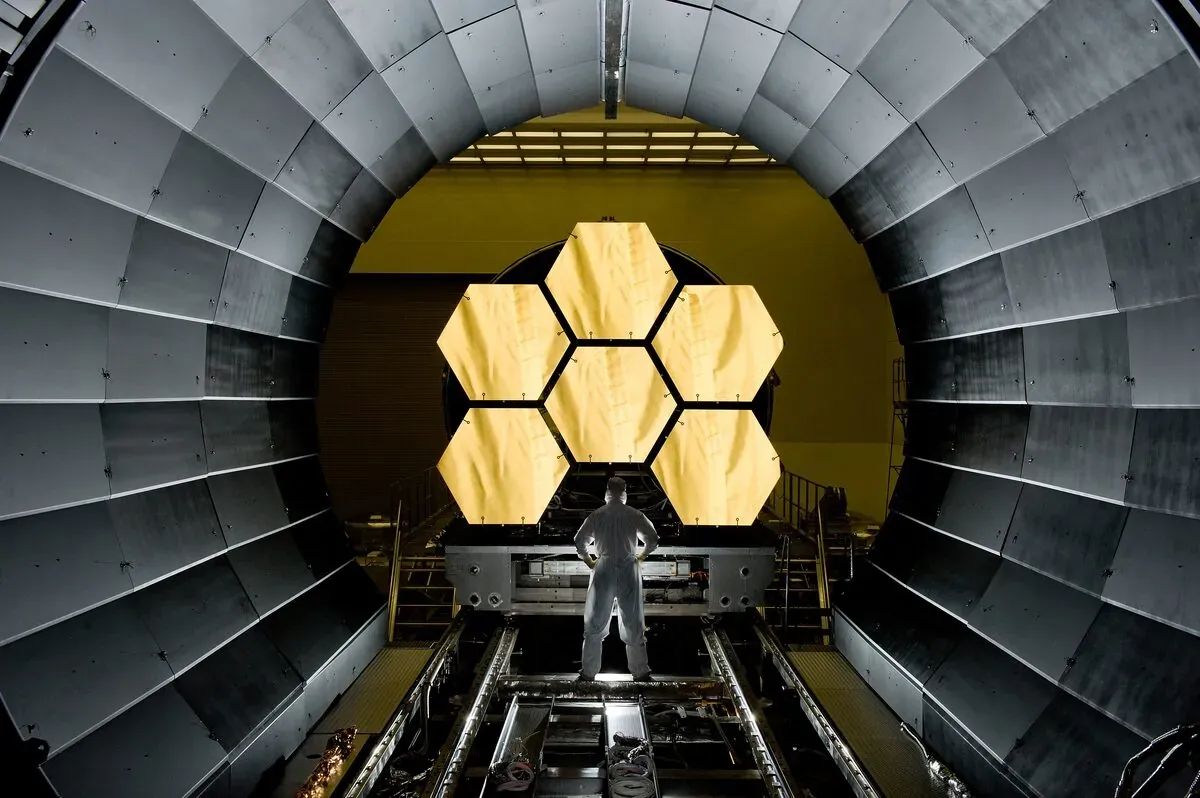 The gold-coated, 18-segment primary mirror of the James Webb Space Telescope