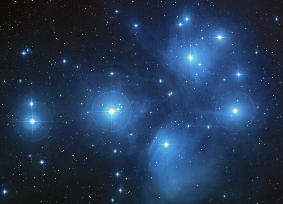 Open star cluster — the Pleiades, young stars born from the same nebula