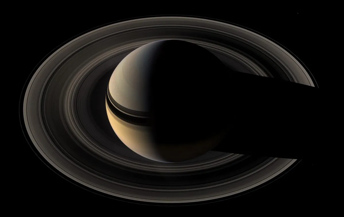 Saturn and its rings backlit by the Sun, imaged by the Cassini spacecraft