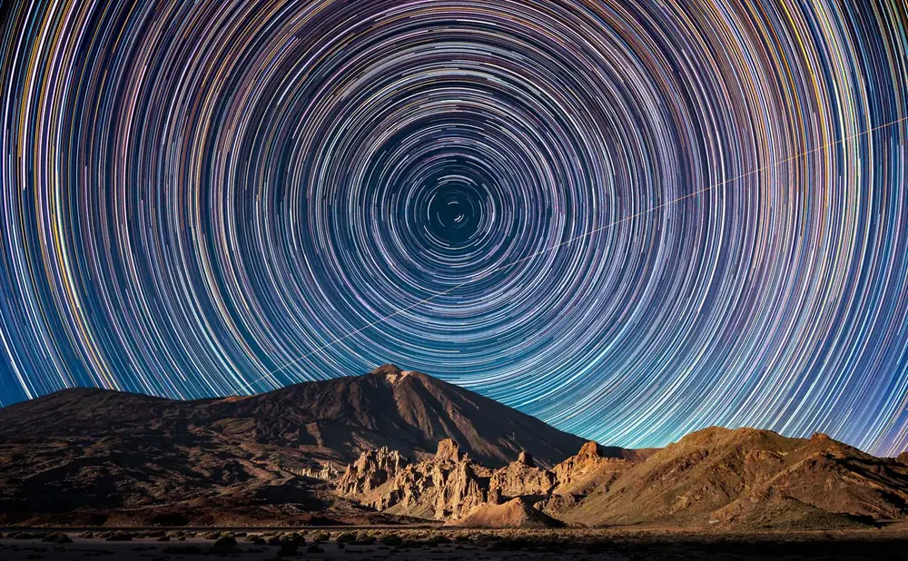 Star trails wheeling around Polaris over the Teide volcano