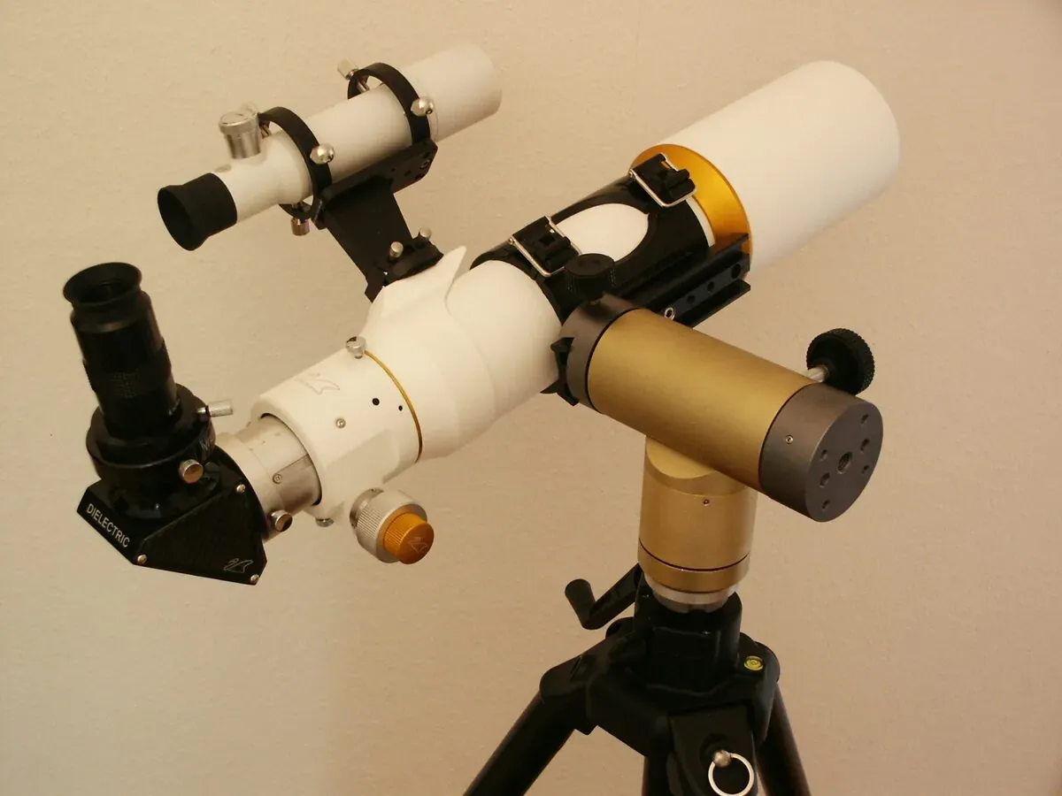 A small refractor on an altazimuth mount with slow-motion control knobs