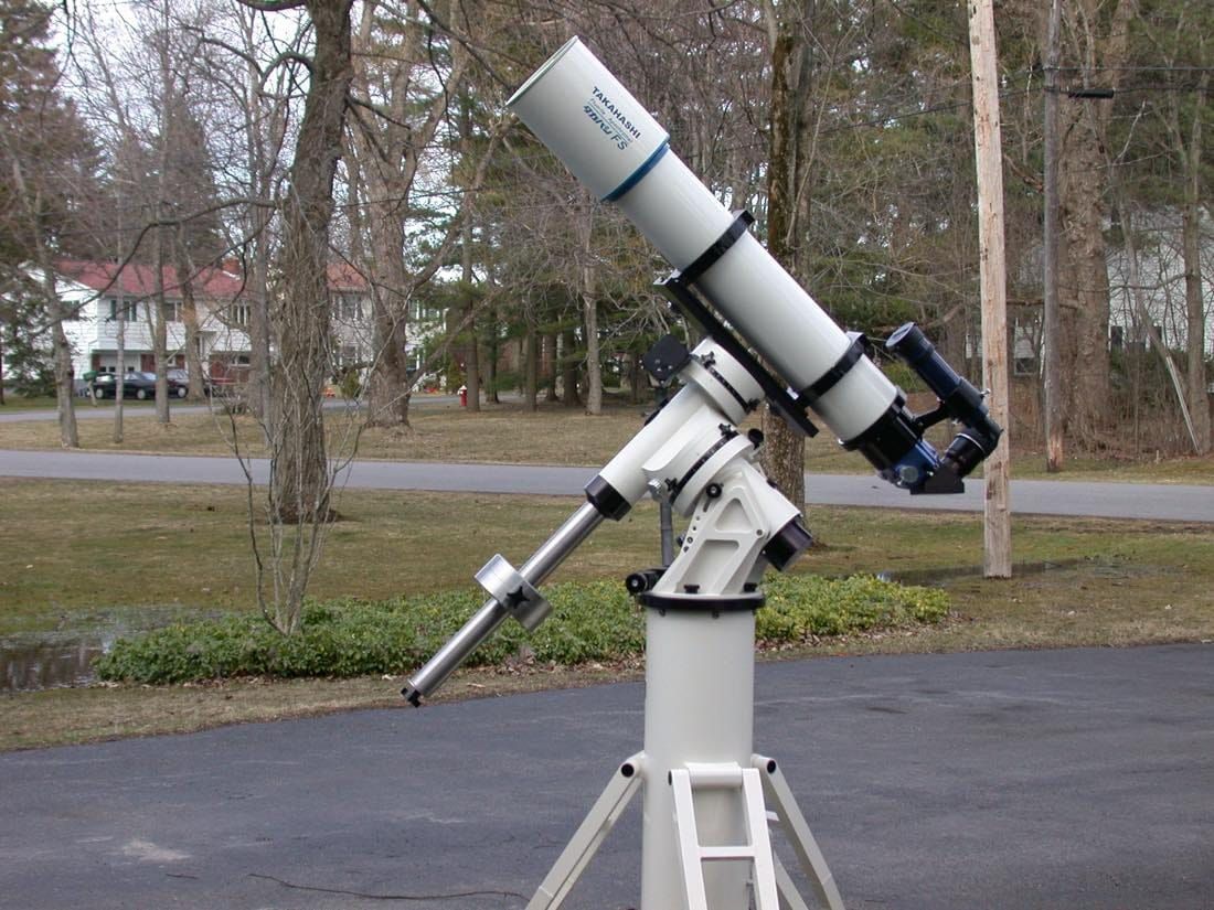 A German equatorial telescope and camera rig used to capture calibration frames in astrophotography