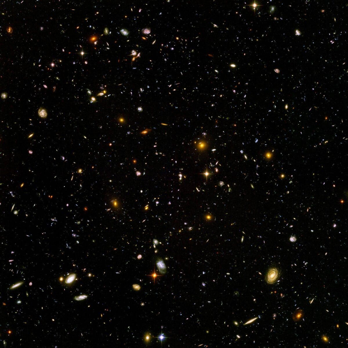 Galaxy types across the Hubble Ultra Deep Field, from spirals to ellipticals