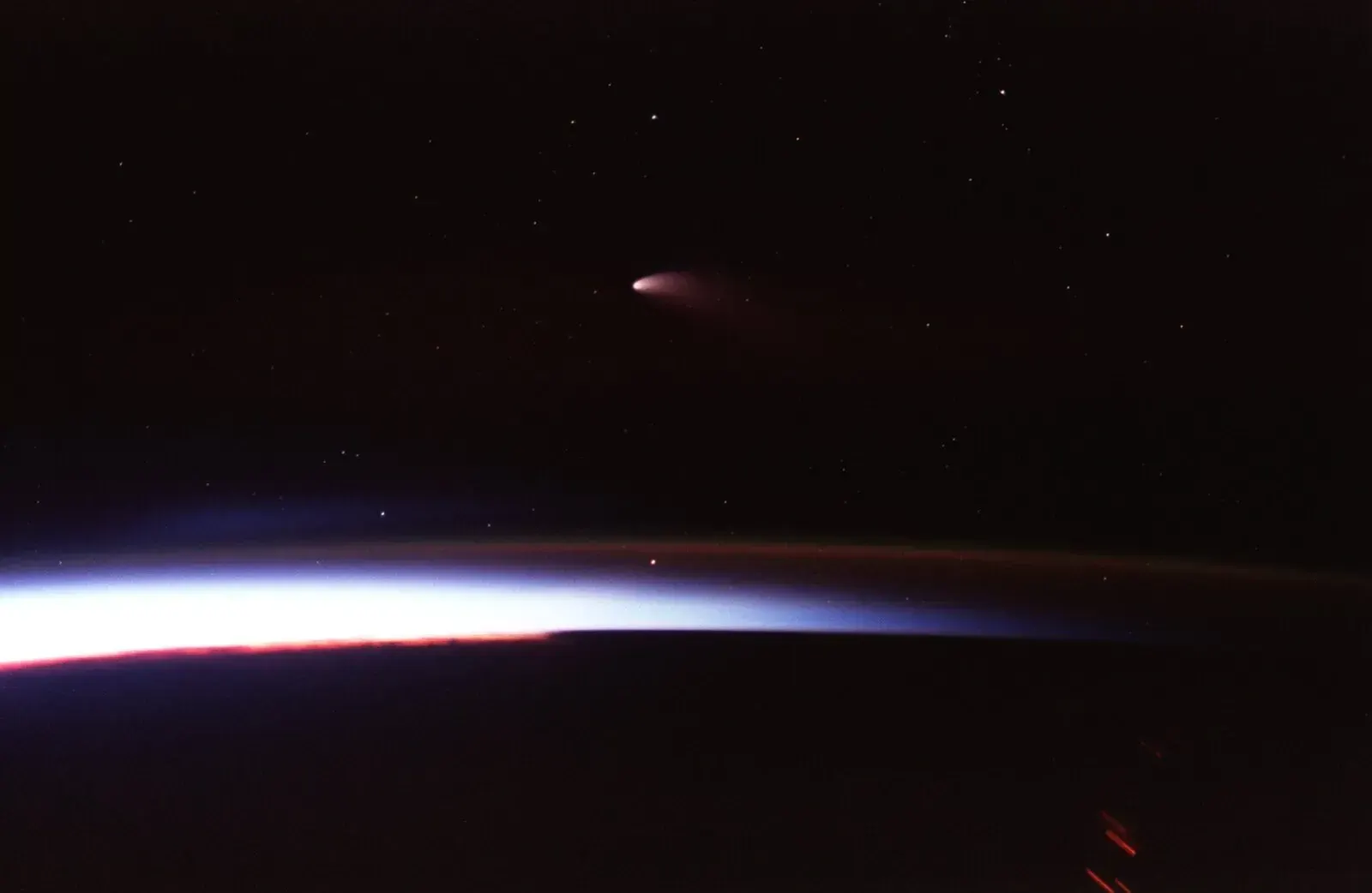 Comet Hale-Bopp, co-discovered by amateur Thomas Bopp, photographed from Space Shuttle Columbia in 1997