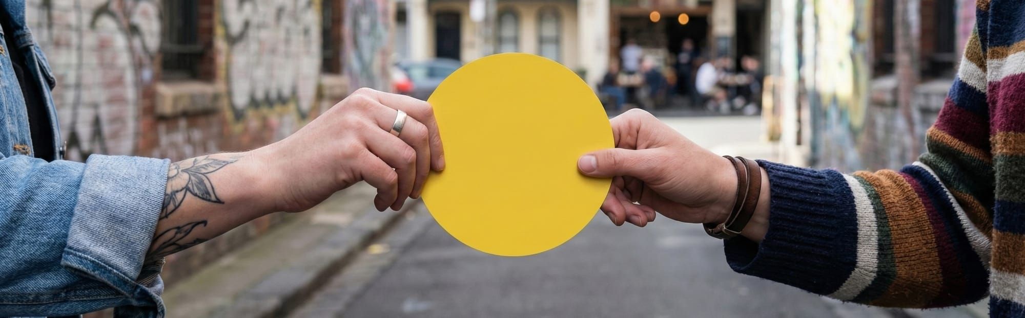 ShareCraft handing over practice knowledge as a yellow cardboard dot