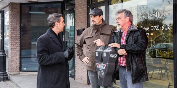 En pleine discussion sur la question du stationnement au centre-ville de Saint-Jérôme: le maire Stéphane Maher, Lionel Ducrea