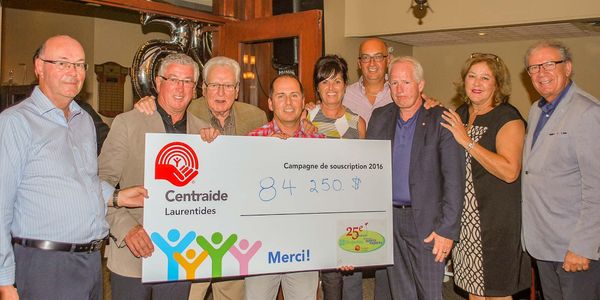 John Halpin, coordonnateur du comité organisateur, avec le président d'honneur Jacques Giguère, des restaurants McDonald’s et