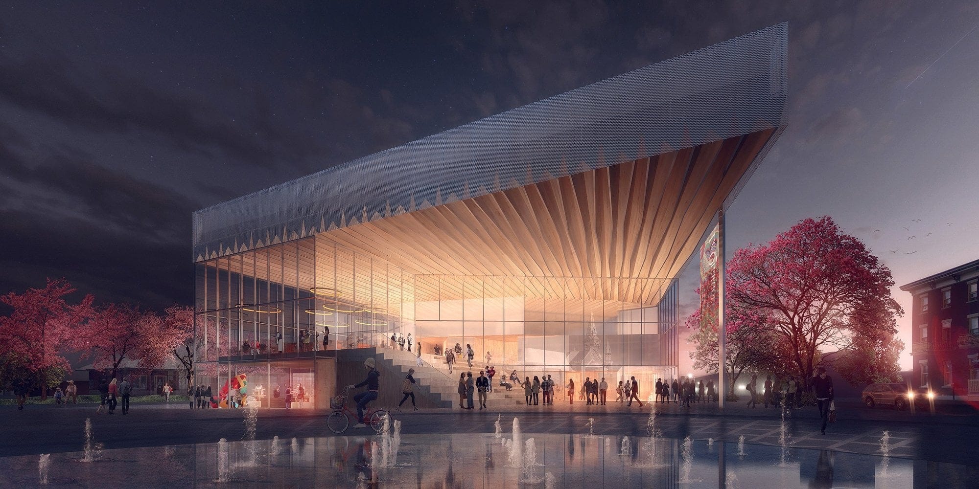 La façade principale du bâtiment, un soir de spectacle, tel que conçu par la firme Atelier TAG | Jodoin Lamarre Pratte, architectes en consortium.