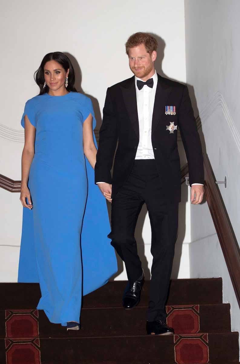 Huzzah: Meghan Pulls Out a Gorgeous Cape Dress in Fiji