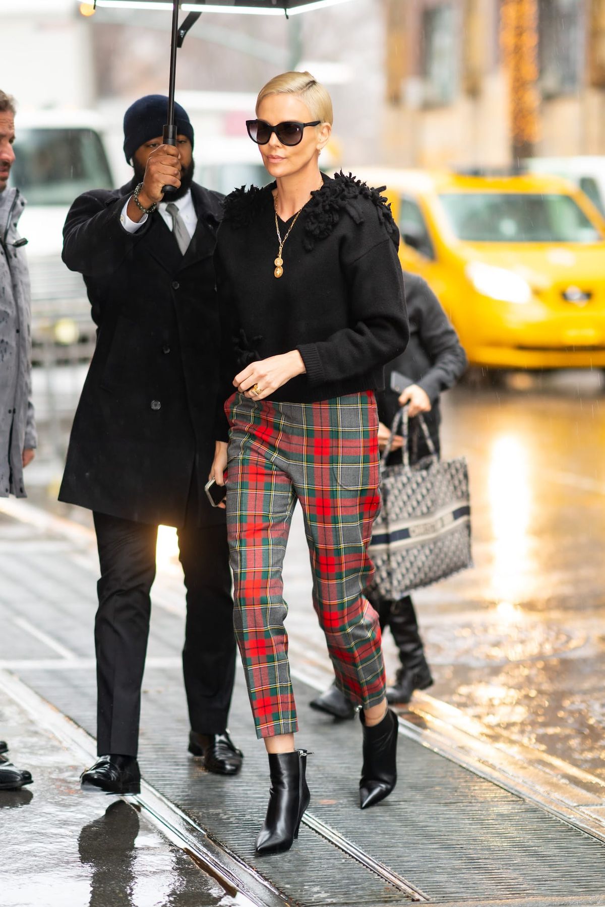 Charlize Is Wearing Real Festive Pants