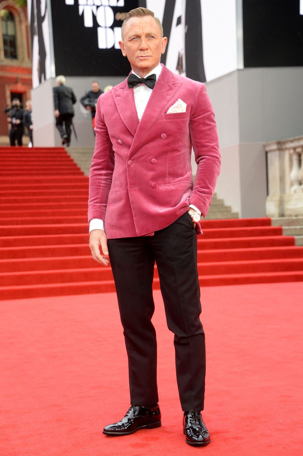The Bond Premiere Brought TWO Bright Yellow Frocks and a Pink Jacket