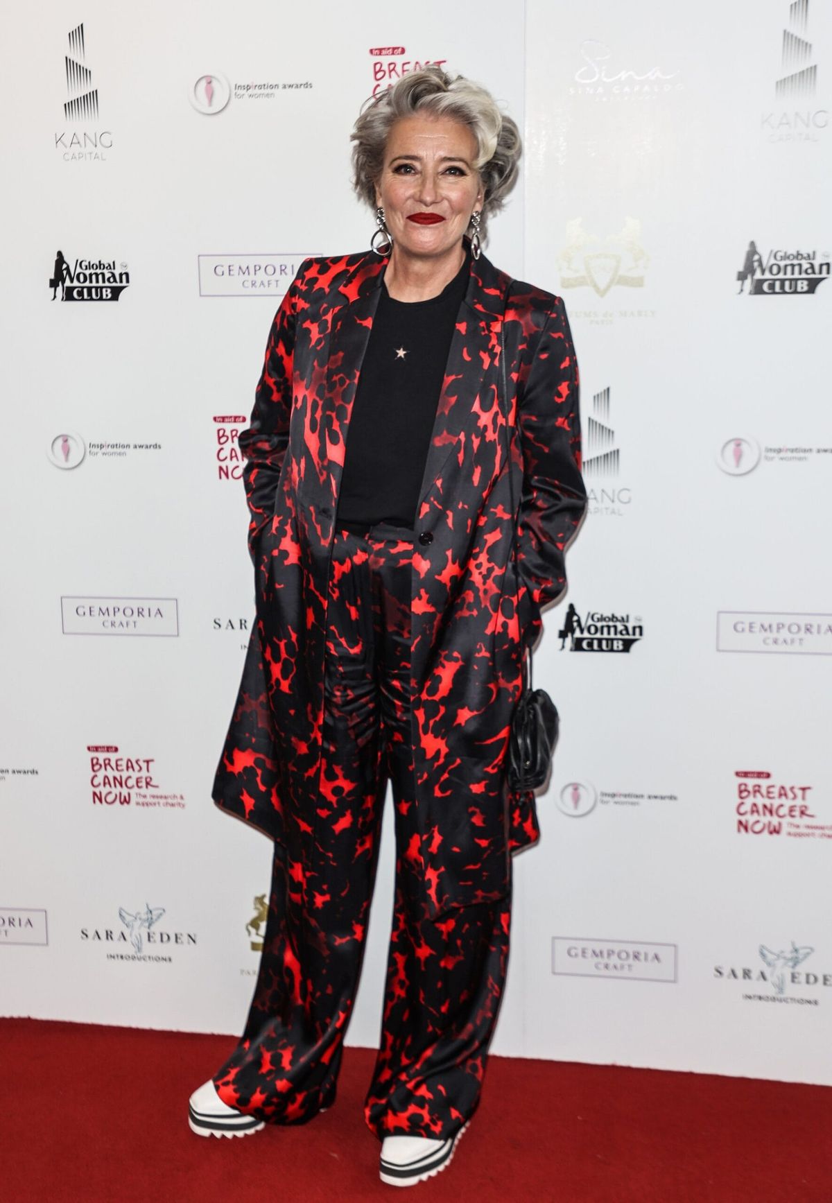Wanna See Emma Thompson in a Great Coat/Pants Situation?