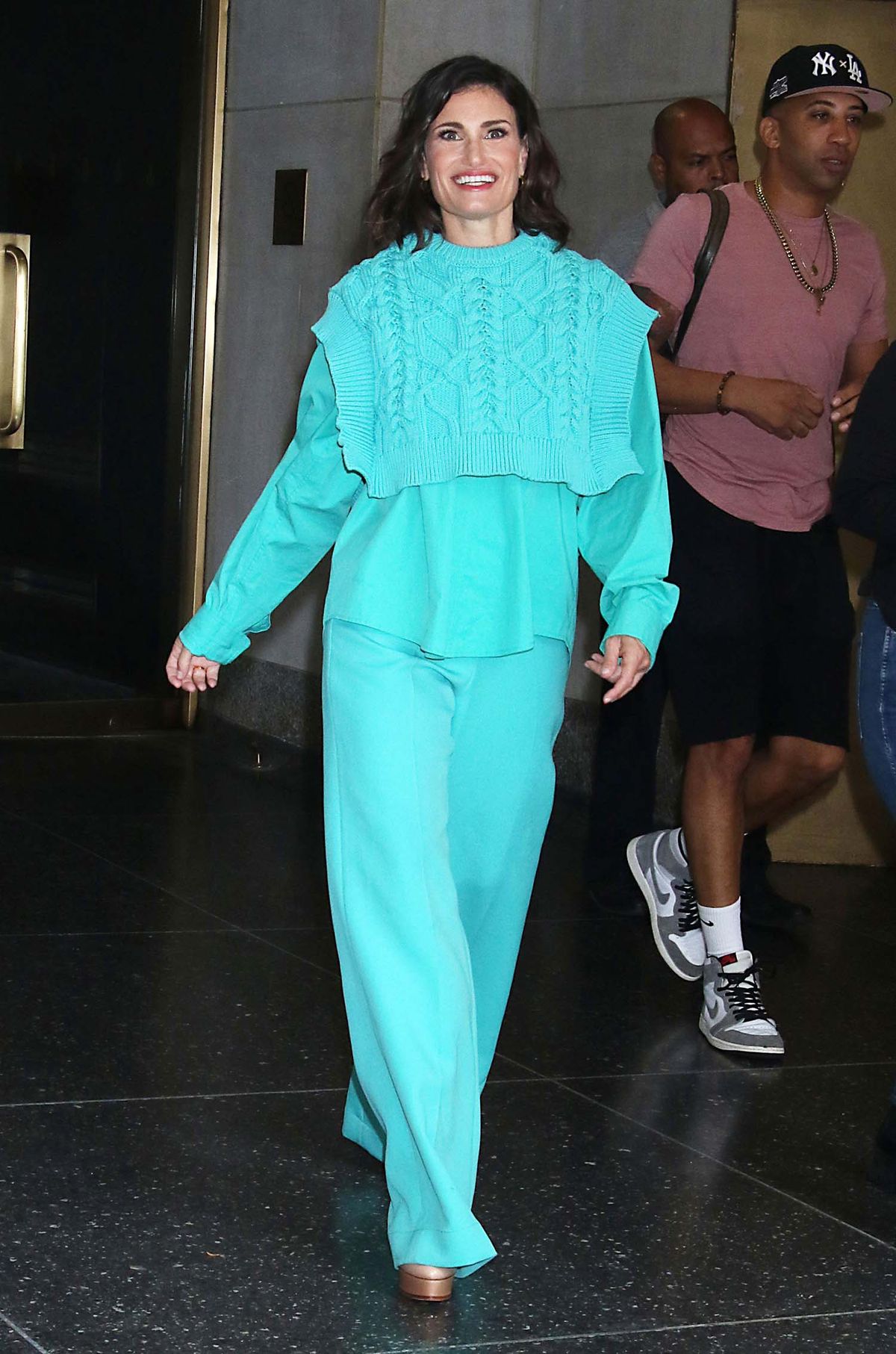 Idina Menzel Is Wearing a... Sweater Bib?