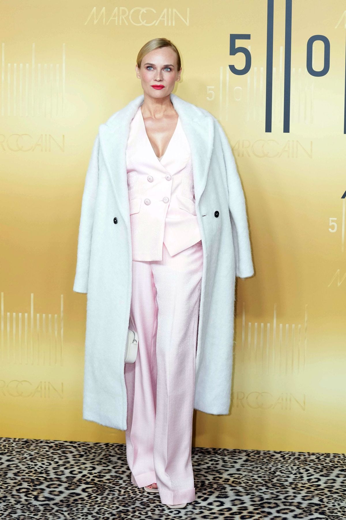 Diane Kruger Looks Very Cool in a Light Pink Suit