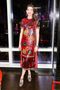 Anne Hathaway Wears a Festive Valentino Throw Rug