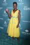 Lupita Perks Up The Joint in Carolina Herrera
