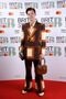 Harry Styles Popped By to Collect a BRIT in Brown