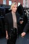 Charlize Theron Wore a...Creative?... Outfit to Get Paid for Opening a Breitling Store