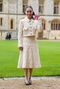 Emilia Clarke Goes VERY Prim to Get Her MBE