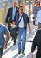 Glen Powell Looks Casually Good Carrying His Dog Around