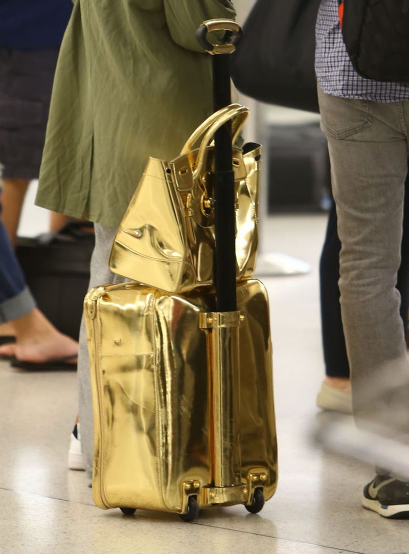 Fugs and Fabs: Celebrities Wearing Things On Planes
