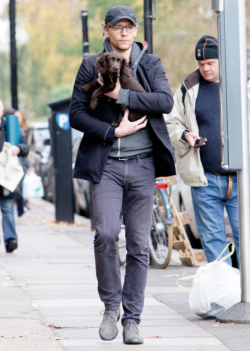 Tom Hiddleston Is Literally Walking Around London Cradling a Puppy