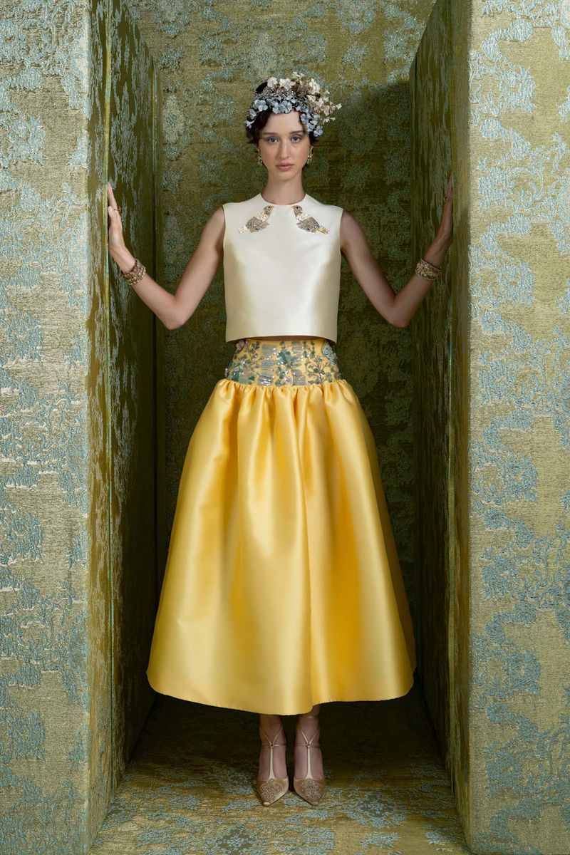 The Reem Acra Pictures Are All... Women In Fancy Boxes?