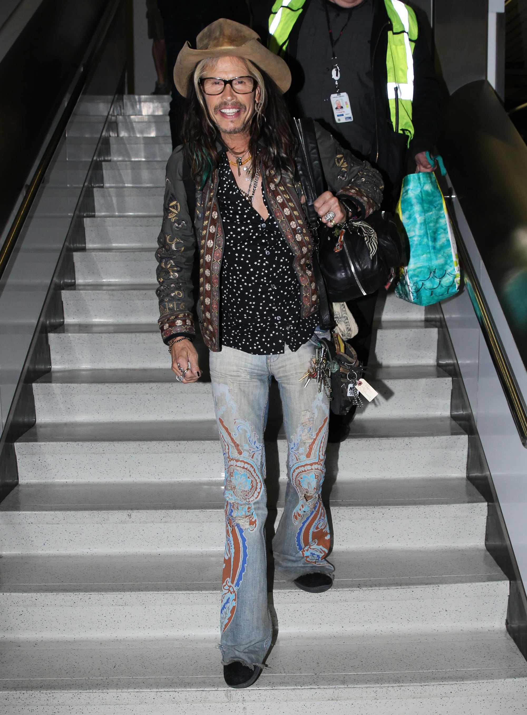 Exclusive... Steven Tyler Arriving On A Flight In Boston