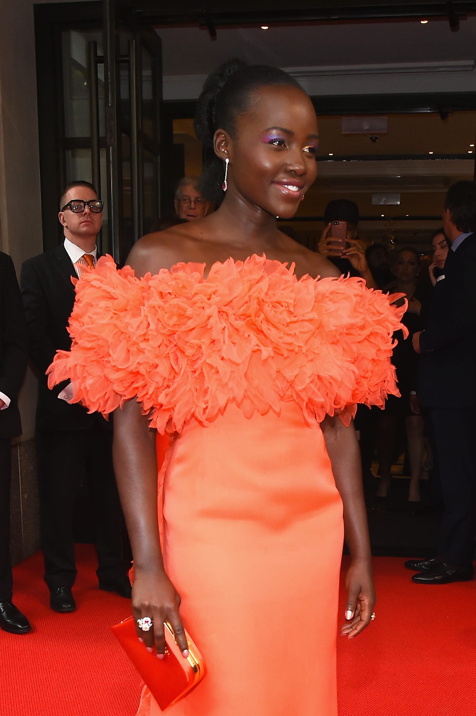 Lupita Wears an Orange Prada to the Met Gala