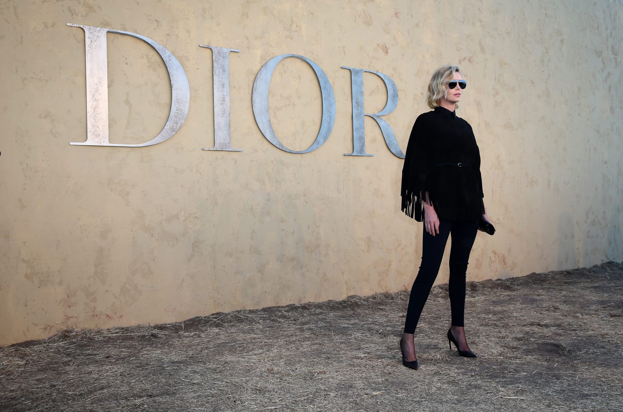 Yes, Even Charlize Theron Looks Hotter In Sunglasses