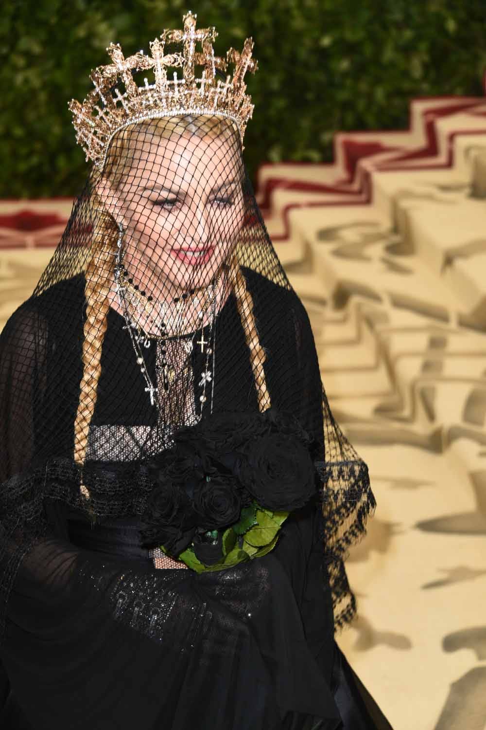 Next Stop On Our Tour of Met Gala Headgear: Veils and Hoods