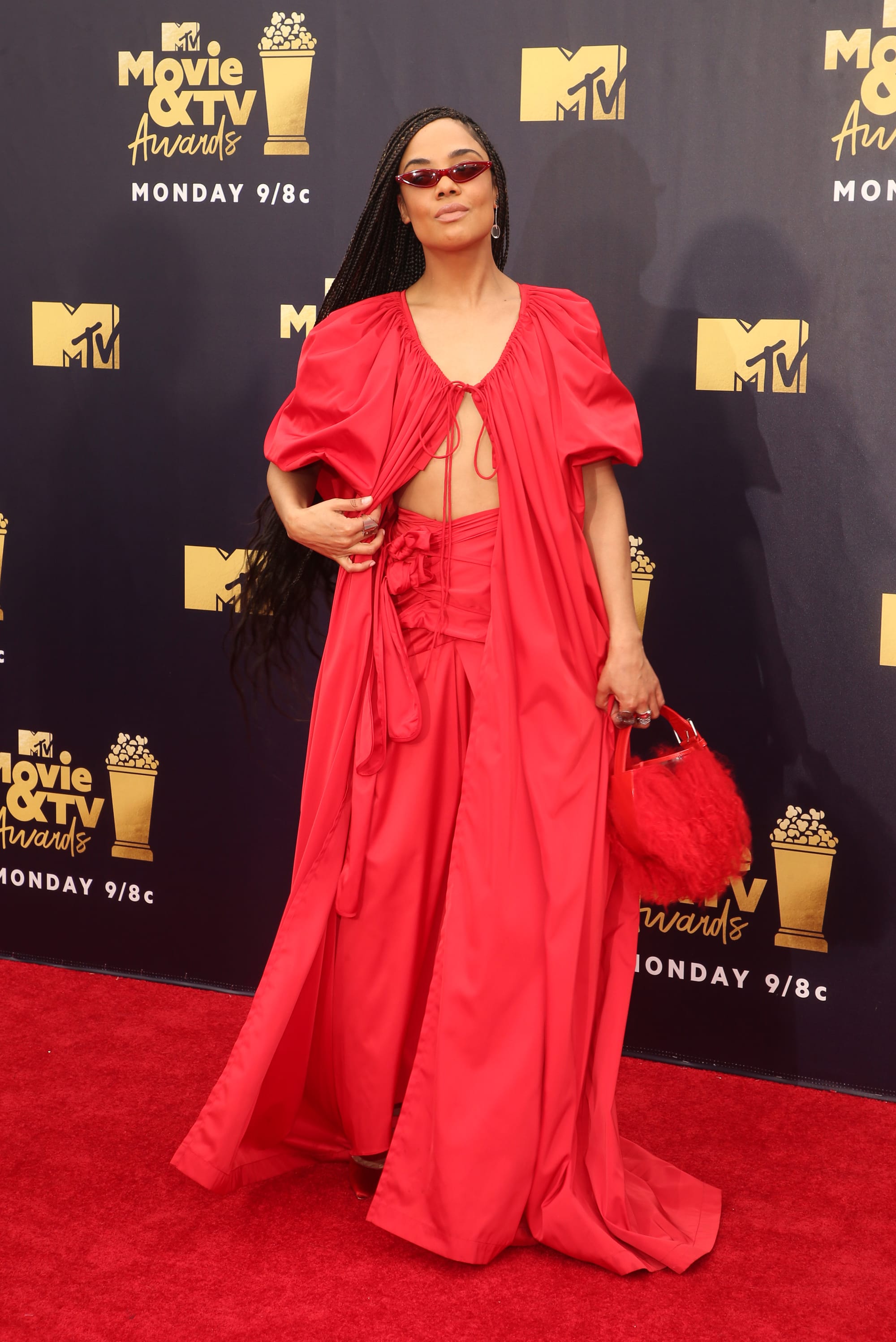 Tessa Thompson's Red Rosie Assoulin Dress Is...