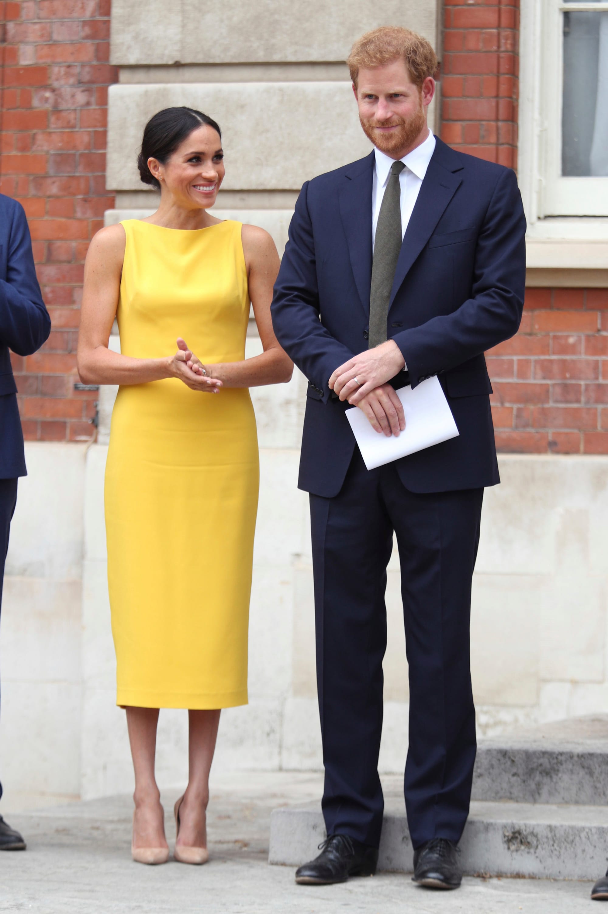 Meghan Goes For Bright Yellow With Harry Today