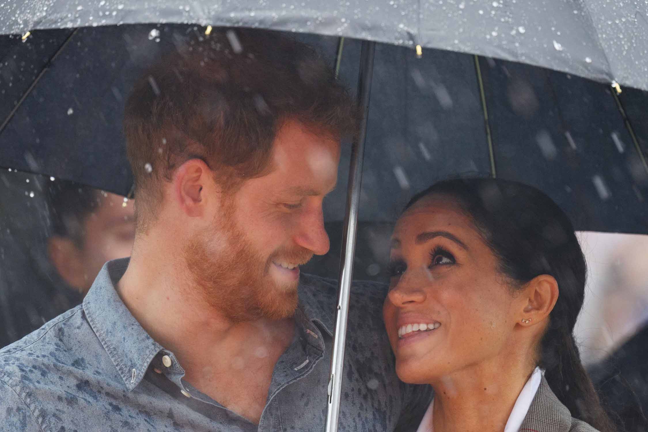 Royal Tour: Meghan and Harry Get a Spring Rain