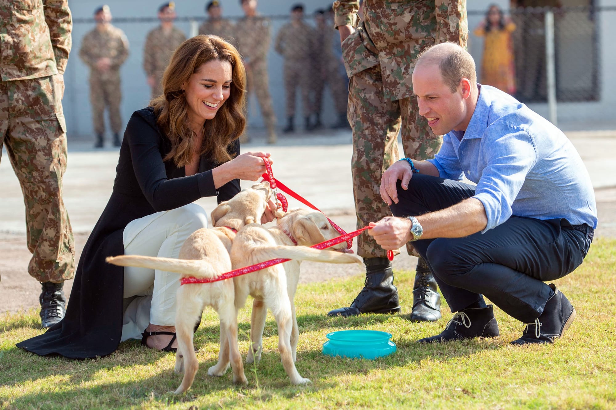 Wills and Kate Wrap Up Their Tour of Pakistan With Puppies