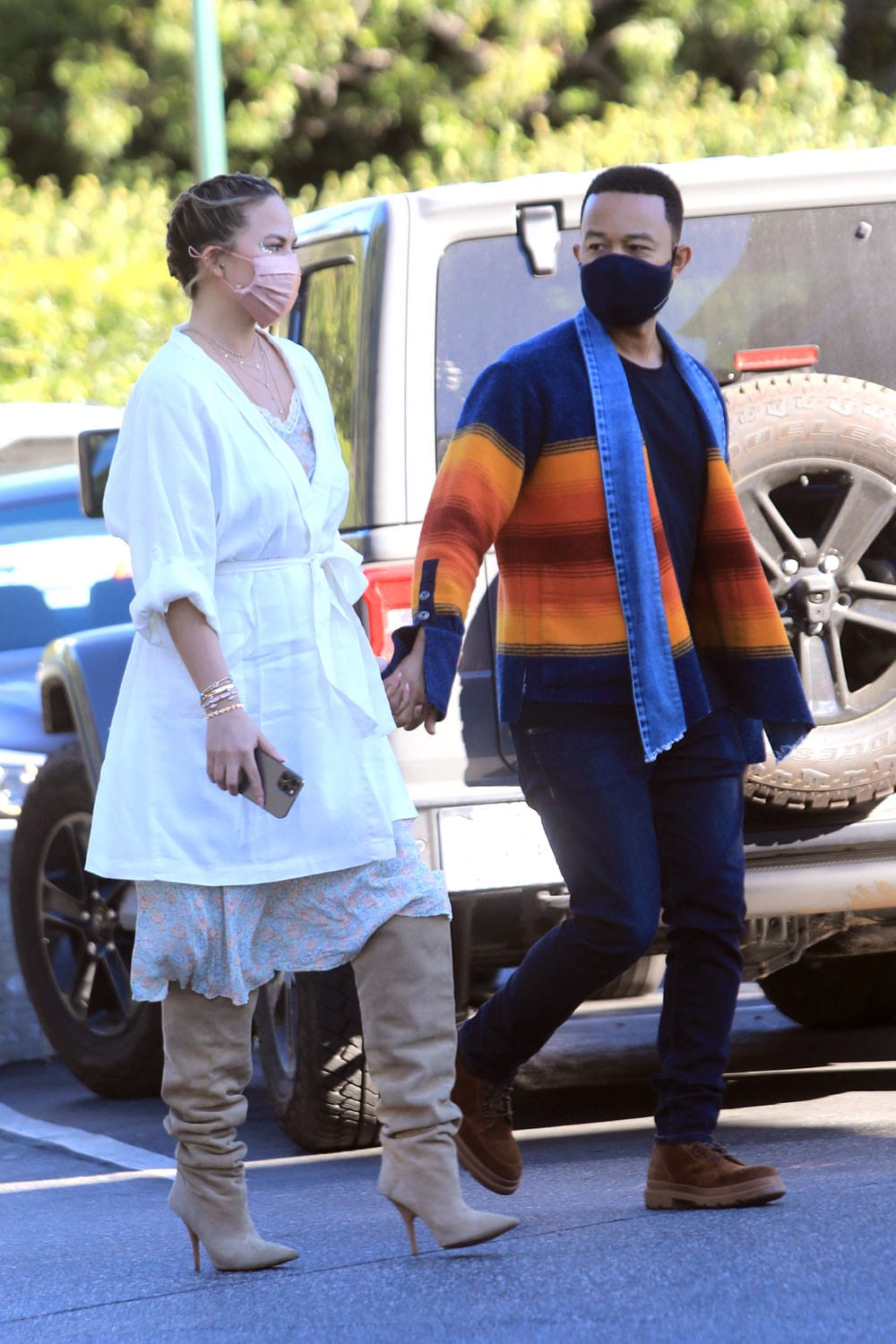 Is Chrissy Teigen Wearing One of Her Robes as a Coat?
