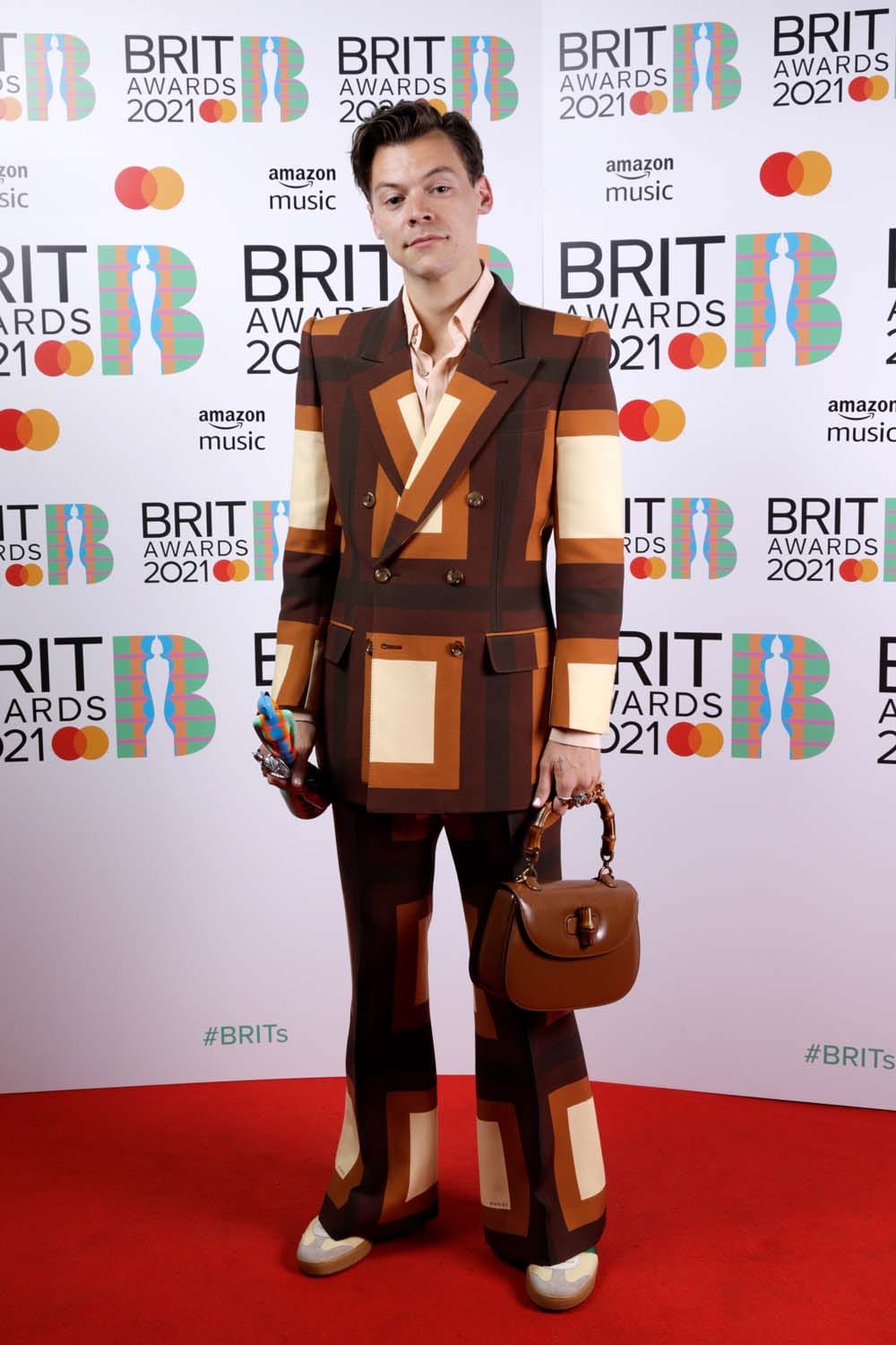 Harry Styles Popped By to Collect a BRIT in Brown