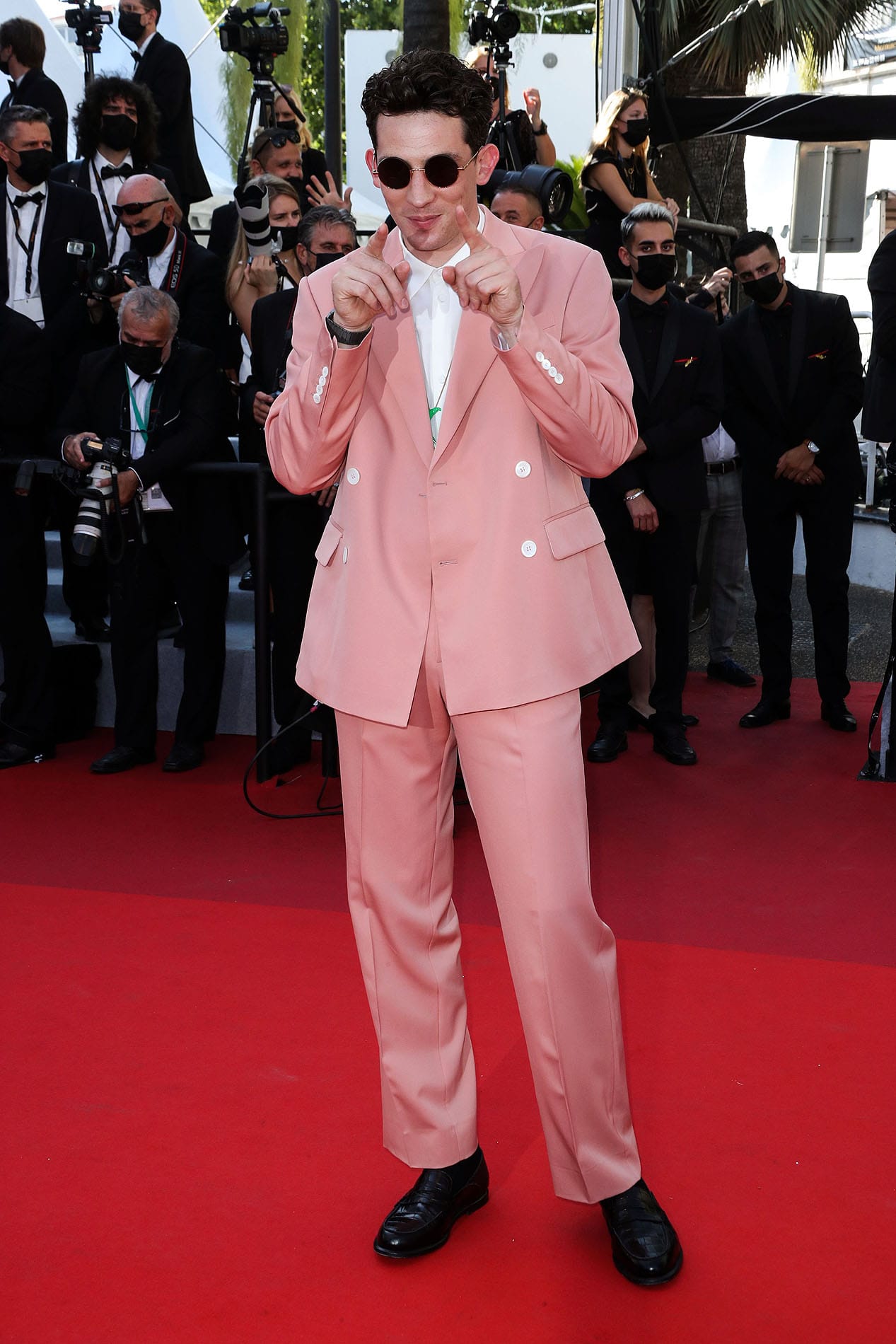 Today's Dispatch From Cannes Brings Dramatic Capes, a Great Suit, and VERY Big Hair