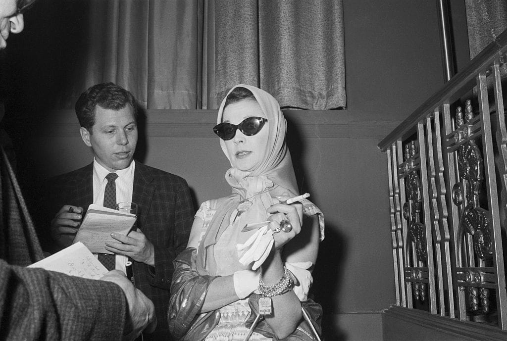 On This Day in 1960, Vivien Leigh Looked HIGHLY ANNOYED in a Scarf and Sunglasses