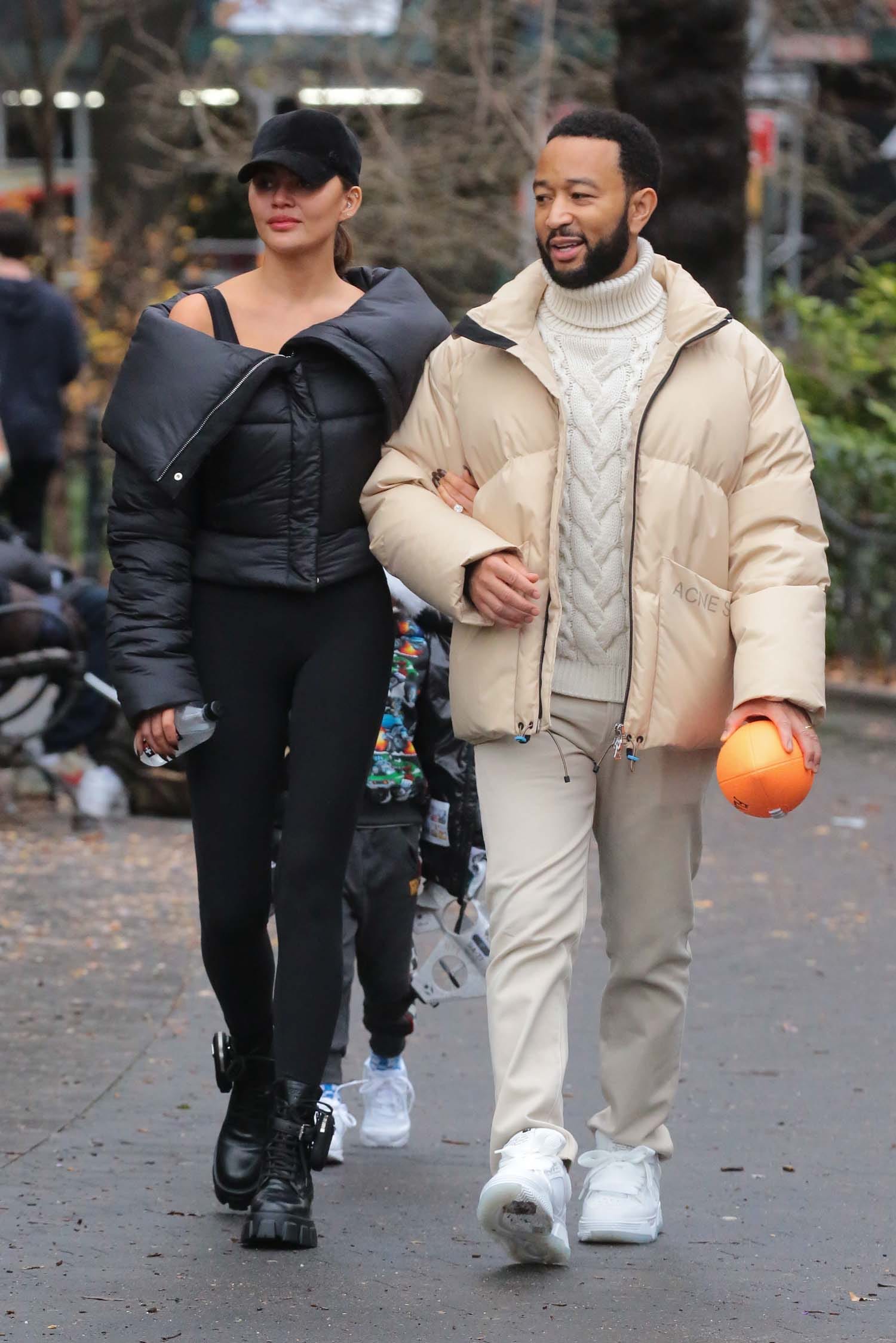 Next In Your Post-Holiday Programming, Chrissy Teigen and John Legend Play Football in the Park