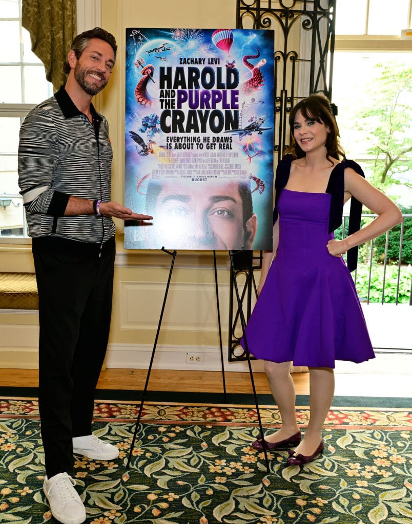 Zooey Deschanel Keeps Promoting "Harold and the Purple Crayon" in Purple