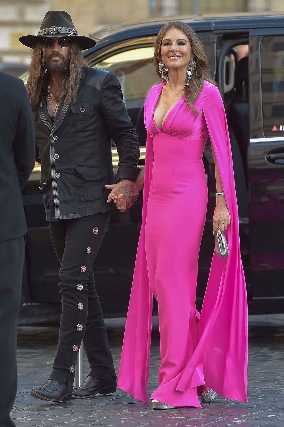 Elizabeth Hurley and Billy Ray Cyrus Are Still Happening